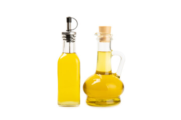 Obraz na płótnie Canvas Bottle of fresh olive oil and olives with leaves isolated on white background. Delicious olive oil in a glass bottle. olive oil bottle. Salad dressing. Oil for frying.
