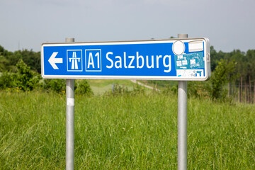 Road sign from the direction of movement towards the Austrian city of Salzburg