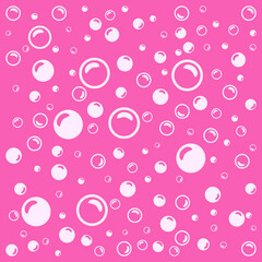 soap bubbles on a pink background.