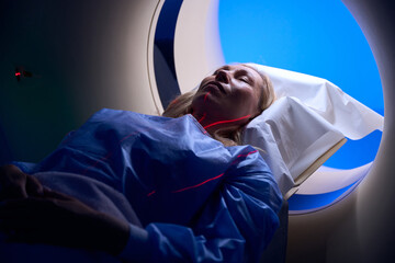 Adult patient is undergoing computed tomography of chest