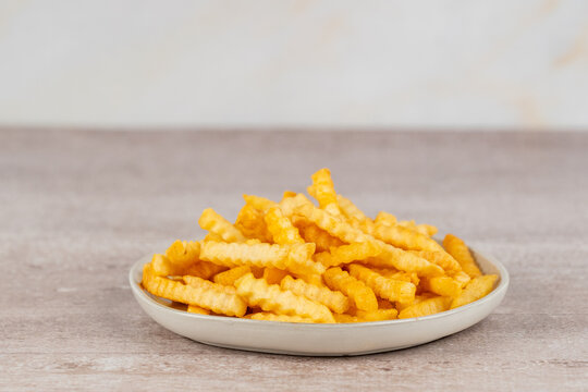 Seasoned crinkle fries