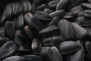 A macro shot of sunflower seeds. Close up. - Powered by Adobe