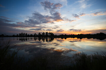 Fototapeta premium Beautiful vivid sunset with sky and cloud