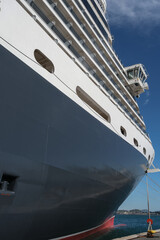 Classic british luxury ocean liner cruiseship cruise ship in port with detail view of steel hull,...