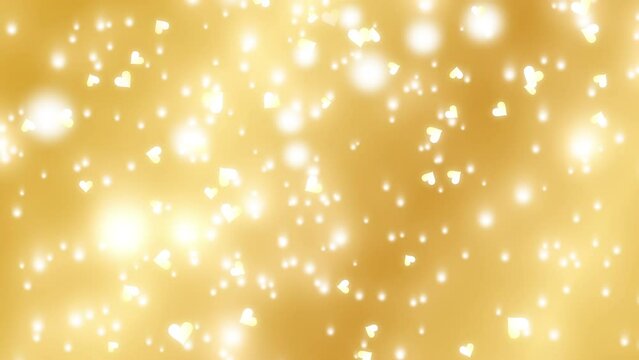 Abstract background footage with white heart shapes and white lights falling on gold gradient background. For Happy Valentine's day and wedding ceremony.