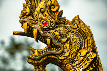 Golden dragon head carved in wood, Phuket, Thailand