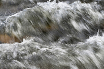 stream flowing into the water
