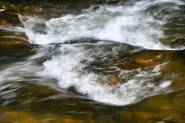 water flowing over rocks