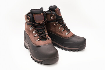 Insulated rubber men's work shoes on a light background for work on the street, construction, in the fields