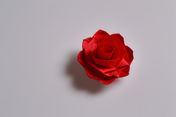 origami single red rose Handmade paper craft. paper polygonal origami. Generated with AI