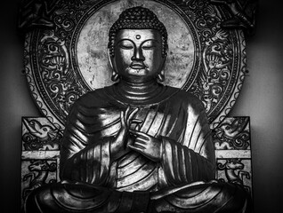 Black and white Buddha statue in the temple