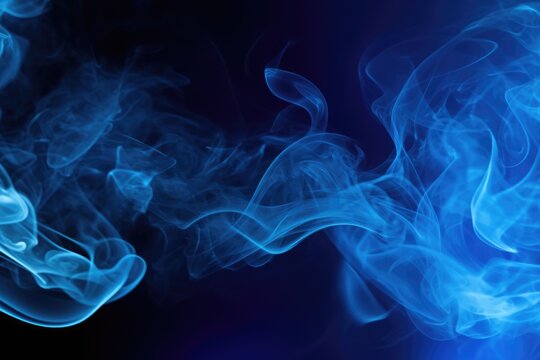 Close up view of smoke on a black background. Can be used as a background image for various design projects