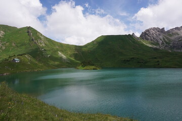 Beautiful turquoise color of lake Schrecksee in the german Alps, Allgäu, Germany