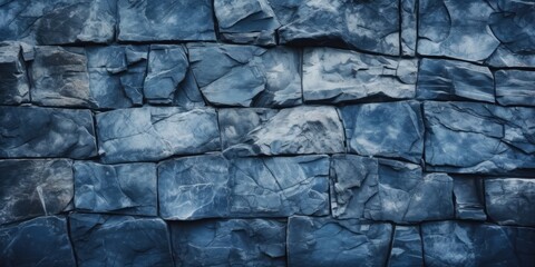 A picture of a wall made of blue stone blocks. Can be used for architectural projects or as a background texture