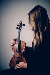 violin in female hands close-up