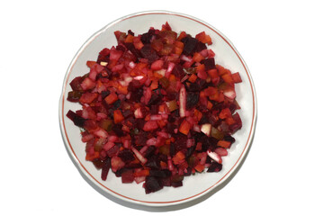 Healthy eating. Boiled vegetables. Vinaigrette salad in a plate, top view.