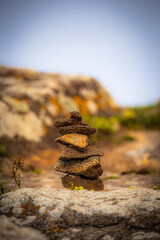 Fitas small piles of stacked flat stones ancient symbols of roads groups of stacked stones broceliande king arthur excalibur