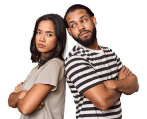 Latin couple back-to-back, angry, side glancing, studio setting