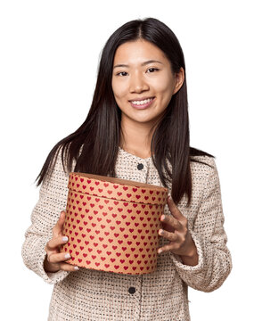 Young Chinese woman with gift box for Valentine's