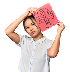 Young Chinese woman holding a Happy Valentine's sign