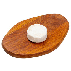 Soft cheese on a wooden board on a white background, isolated