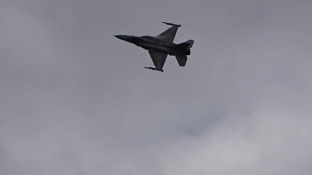 Fighter Jet fighter f16 F 16 full power flypast at air base
