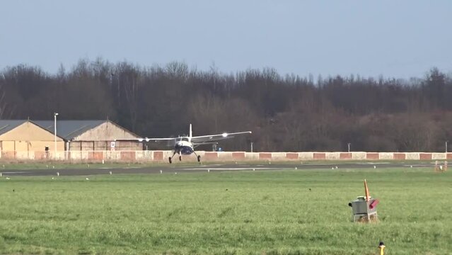 Regional Airplane Landing Arriving Arrival Touchdown at a Regional Small Local Airport Airfield