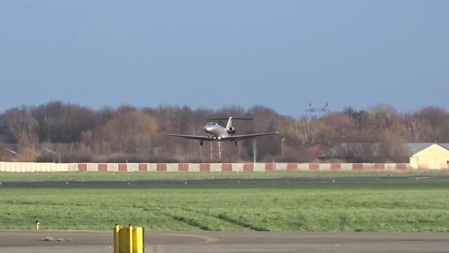 Private Jet Business jet Corporate Jet Executive Jet Taking Off Take off departure departing at Regional Small Airport Airfield