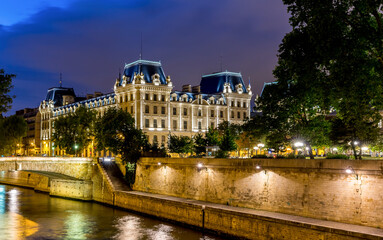 Historic building in Paris on the Seine at night