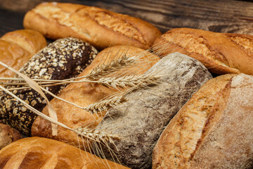 Fresh loaves of bread, various breads for toasts and sandwiches, delicious crispy breads,...
