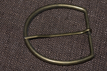 bronze decorative element for sewing, metal buckle.