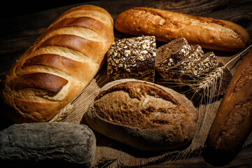Fresh loaves of bread, various breads for toasts and sandwiches, delicious crispy breads,...