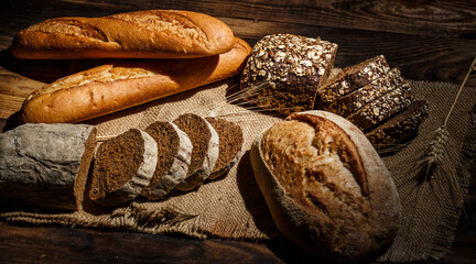 Fresh loaves of bread, various breads for toasts and sandwiches, delicious crispy breads,...