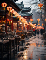 A rainy twilight sets a reflective mood in a lantern-lined traditional marketplace.