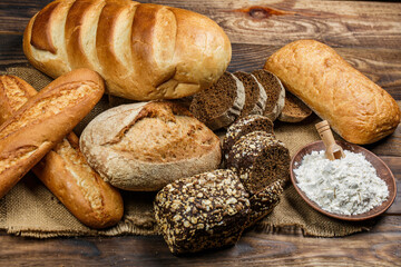 Fresh loaves of bread, various breads for toasts and sandwiches, delicious crispy breads,...