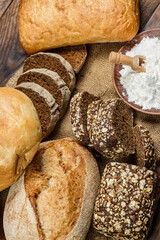 Fresh loaves of bread, various breads for toasts and sandwiches, delicious crispy breads, gluten-free breads, fresh flour and wheat breads