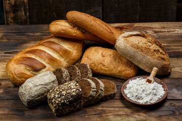 Fresh loaves of bread, various breads for toasts and sandwiches, delicious crispy breads,...