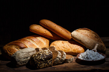 Fresh loaves of bread, various breads for toasts and sandwiches, delicious crispy breads,...