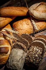 Fresh loaves of bread, various breads for toasts and sandwiches, delicious crispy breads,...