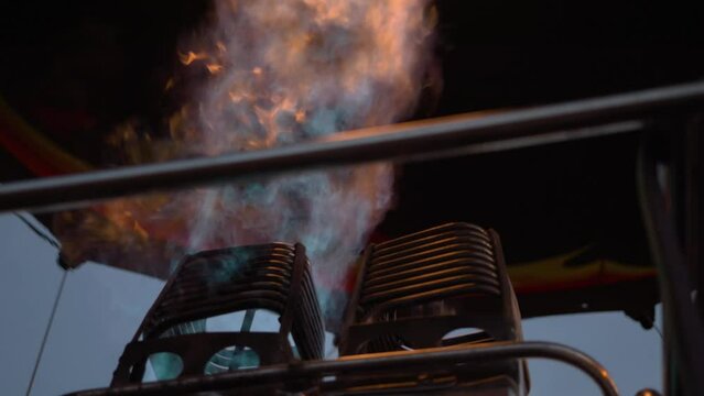 Close up of the fire mechanisms that make hot air balloons fly during a beautiful sunrise in the mountains of Serra da Canastra in Minas Gerais, southeastern state of Brazil