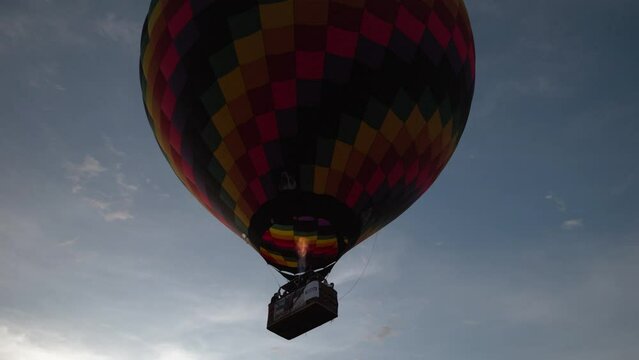 Hot air balloons flying during a beautiful sunrise in the Serra da Canastra mountains in Minas Gerais, southeastern state of Brazil