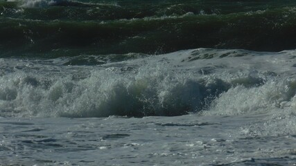 Rough blue sea and foamy waves from the November swells of the Mediterranean