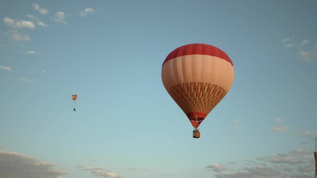 Hot air balloons flying during a beautiful sunrise in the Serra da Canastra mountains in Minas Gerais, southeastern state of Brazil