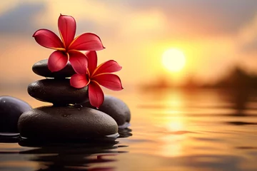 Gordijnen Holistic health concept of zen stones with deep red plumeria flower on blurred background.  © PhotoFlex