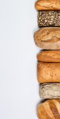 Fresh loaves of bread, various breads for toasts and sandwiches, delicious crispy breads,...