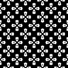 White background with black pattern. Seamless texture for fashion, textile design,  on wall paper, wrapping paper, fabrics and home decor. Simple repeat pattern.
