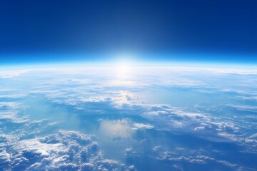 Fototapeta na wymiar Radiant sunrise over Earth's atmosphere. Earth Day concept. Global perspective. Space exploration. Design for banner, backdrop, or poster