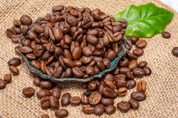 Arabica brown roasted coffee beans from Africa coffee producing region, cultivating in Ethiopia, Ivory Coast, Uganda, Kenya, Rwanda and Tanzania