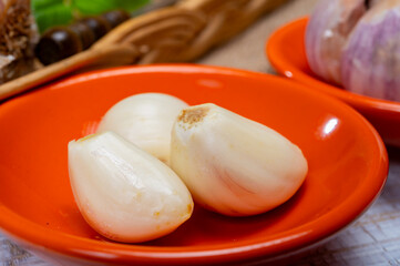Cooking with dried French garlic. Red garlic. Violet garlic.