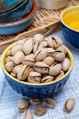 Roasted salty pistachio nuts, tasty healthy vegetarian snack food